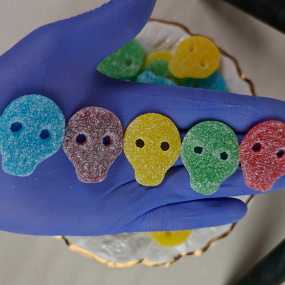 The five SGAB skull flavours side by side — blueberry, grape, pineapple, lime and strawberry