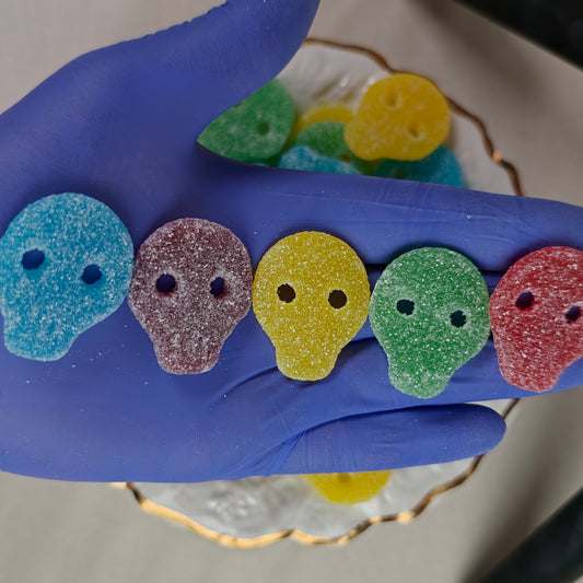 The five SGAB skull flavours side by side — blueberry, grape, pineapple, lime and strawberry